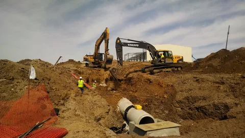 Underground services installation in Auckland NZ with trenching and utility pipes setup