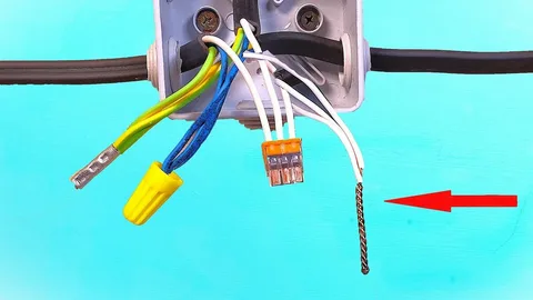 Electrician installing safe electrical wiring electrical connections in an Auckland home